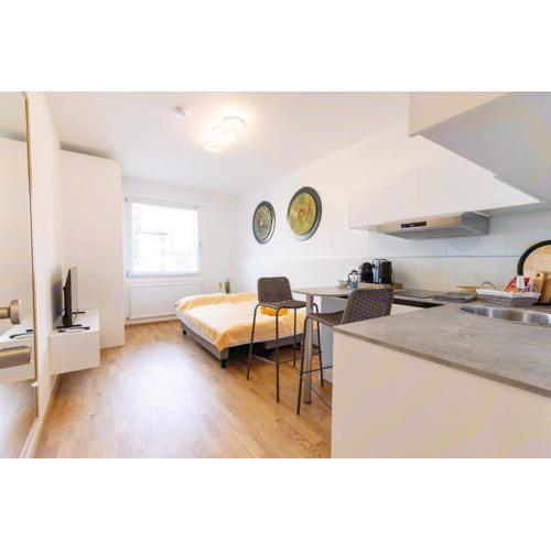 2BR Getaway w Balcony & Fast WiFi, Near Tram