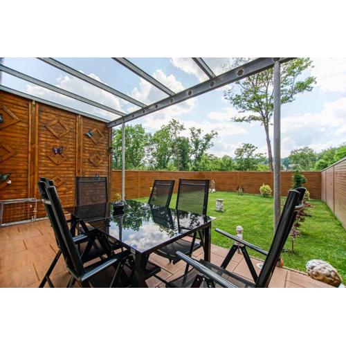 AusZeit Steiraland 1 mit privaten Garten überdachter Terrasse und Parken