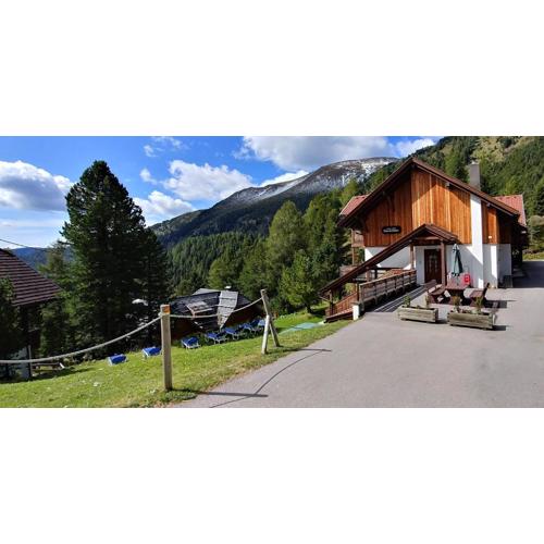 Bergheim Schmidt, Almhütten im Wald Appartments an der Piste Alpine Huts in Forrest Appartments near Slope