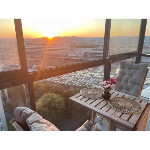 High-rise apartment with sunset