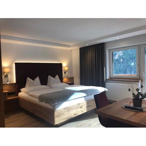 Hotel Garni Central - Zimmer - Studios - Apartments