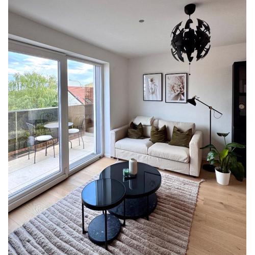 Moderne Ruheoase mit Balkon