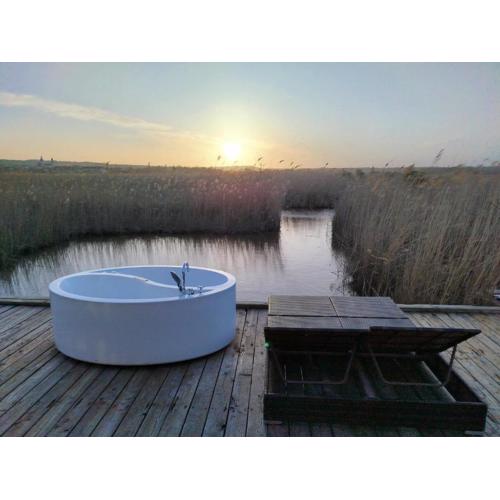 Pfahlbau Sunset II Toplage inklusive Elektroboot
