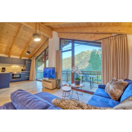 Ski-in Ski-out Chalet Maiskogel 17C - by Alpen Apartments