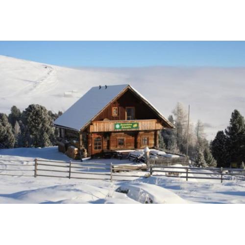 Zirbenhütte am Falkert auf der Heidi-Alm